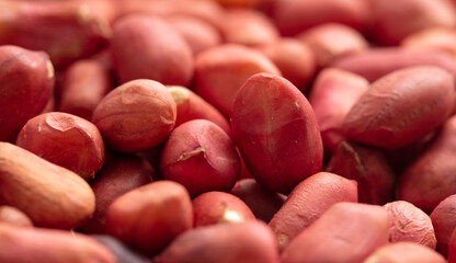 Close up of peanut nuts as background. Macro
