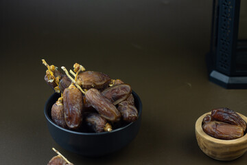 Kurma or Dates fruits, popular sunnah food in Ramadan month for breakfasting. Islamic background for text and template. Ramadan Kareem, Eid Mubarak celebration. 