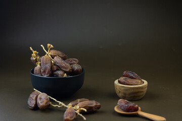 Kurma or Dates fruits, popular sunnah food in Ramadan month for breakfasting. Islamic background for text and template. Ramadan Kareem, Eid Mubarak celebration. 