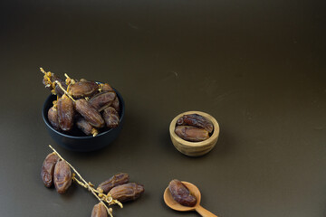 Kurma or Dates fruits, popular sunnah food in Ramadan month for breakfasting. Islamic background for text and template. Ramadan Kareem, Eid Mubarak celebration. 