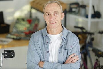 a senior man in workshop