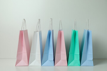 Blank colorful paper bags on white background
