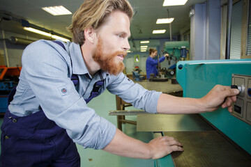 man remotes control in the hands of a production