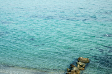 Amazing sea with clear turquoise water and stones
