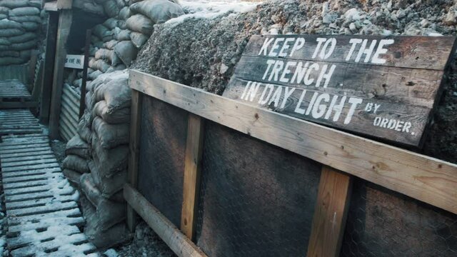 First world war keep to the trench in daylight sign in a ww1 trench dug out in France