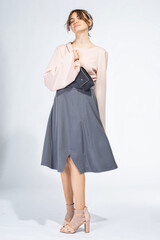 Fototapeta premium Young white woman isolated on light grey