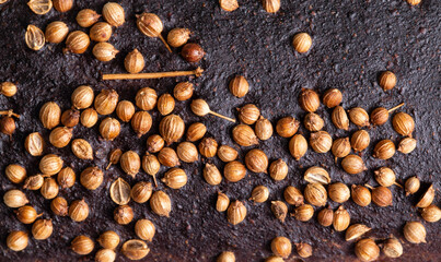 Delicious black bread with coriander seasoning, macro. Healthy and high-calorie bread, background