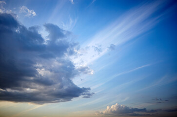 Blue sky background with cumulus clouds