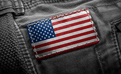 Tag on dark clothing in the form of the flag of the United States of America