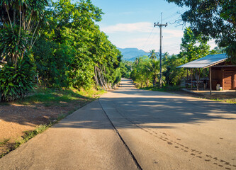 Obraz premium On the small concrete road in the countryside
