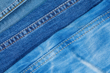 Photo of denim pants from above. Background on the theme of denim clothing.