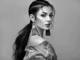 Brunette girl with perfect makeup. Beautiful model woman with curly hairstyle. Care and beauty hair...