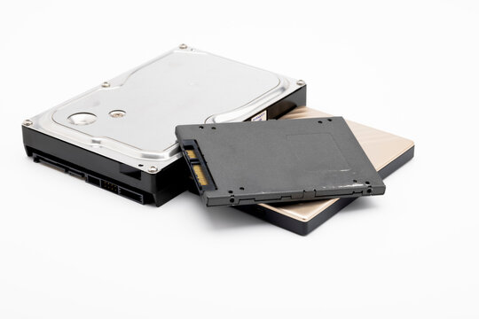 Hard disk and ssd disk (solid state drive) on white background , size comparison of hard disk