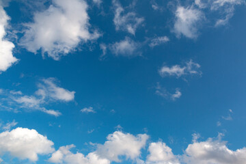 Naklejka na ściany i meble Cloudy sky with a nice blue background