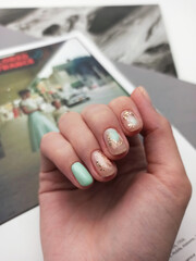 Female hands with nail design. Manicure and Hands Spa. . Beauty treatment. Beautiful woman's nails with beautiful baby boomer manicure copy space for. Manicured nails and Soft hands skin . Closeup