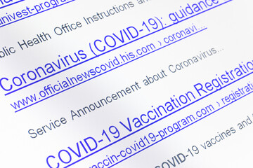 Internet search results for coronavirus with The links of imaginary no-existing websites on display, close up.
