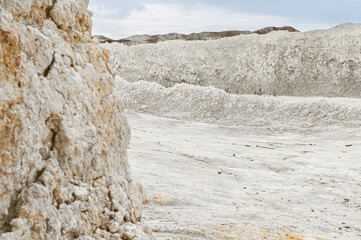 Panorama white clay quarry, large sections light soil, extraction natural resources, close-up