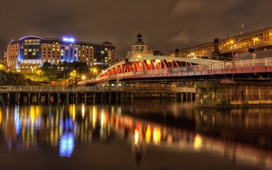 Fototapeta na wymiar Swing Bridge one of the many bridges over River Tyne in Newcastle England.