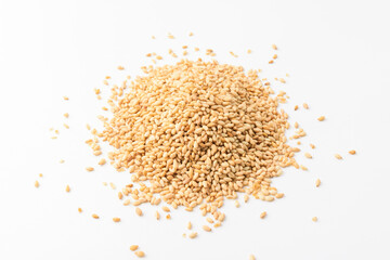 Fototapeta na wymiar Sesame seeds on white background