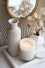 Luxurious white tray decoration, home interior decor with burning candle