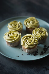 Cupcakes topped with green tea buttercream