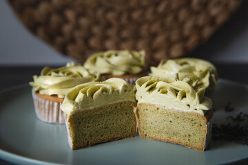 Cupcakes topped with green tea buttercream