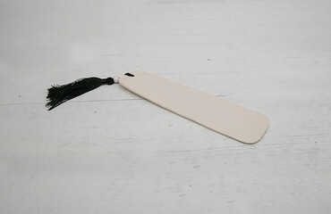 Bookmark on a wooden background