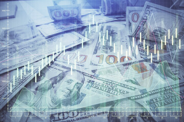 Multi exposure of forex chart drawing over us dollars bill background. Concept of financial success markets.
