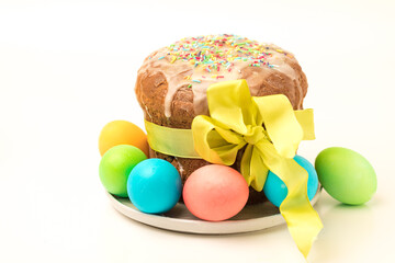 Orthodox baking for the Easter Spring Festival. Traditional cakes and painted eggs. Baking sprinkled with icing,