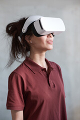 Woman in 3D glasses playing game alone