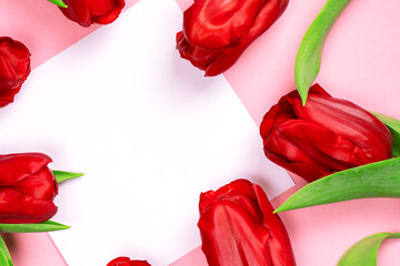 Greeting Card mockup beautiful tulips and place for text. Flat lay template with copy space....