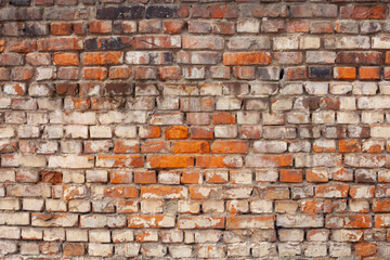 Fragment of an old brick wall