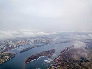 Aerial high view. Flight over the clouds of Kiev.