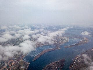 Aerial high view. Flight over the clouds of Kiev.