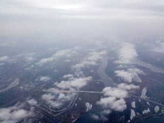Aerial high view. Flight over the clouds of Kiev.