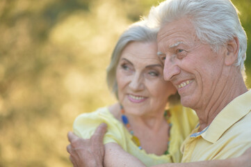 beautiful caucasian senior couple hugging