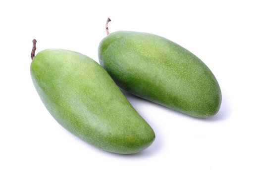 fresh green mangoes on white background.