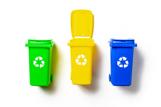 Plastic trash. Yellow, green, blue dustbin for recycle plastic, paper and glass can trash isolated on white background. Bin container for disposal garbage waste and save environment.