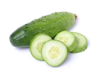  Fresh cucumber and slices on white background.