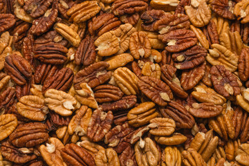 Tasty pecan-nut background. Top view.