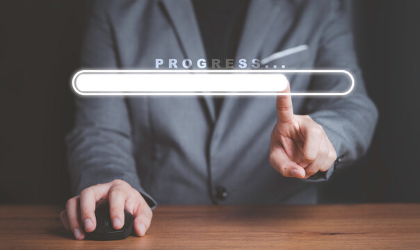 Businessman touching to virtual download bar with loading progressive business.