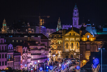 Fototapeta na wymiar Night cityscape of Porto, view with Clerigos Tower, Portugal
