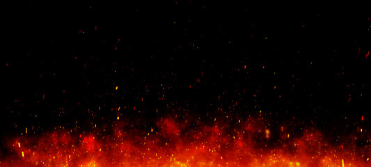 Fire embers particles over black background. Fire sparks background. Abstract dark glitter fire particles lights.	 - obrazy, fototapety, plakaty