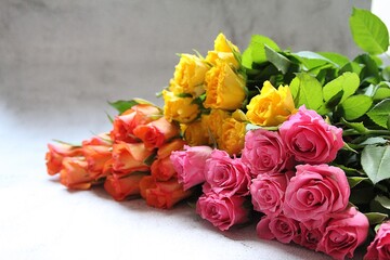 colorful roses, yellow, orange and pink cut flowers, a bouquet of colorful roses, fragrant flowers