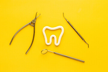 Flat lay of dental equipment tools. Dental care and oral hygiene concept