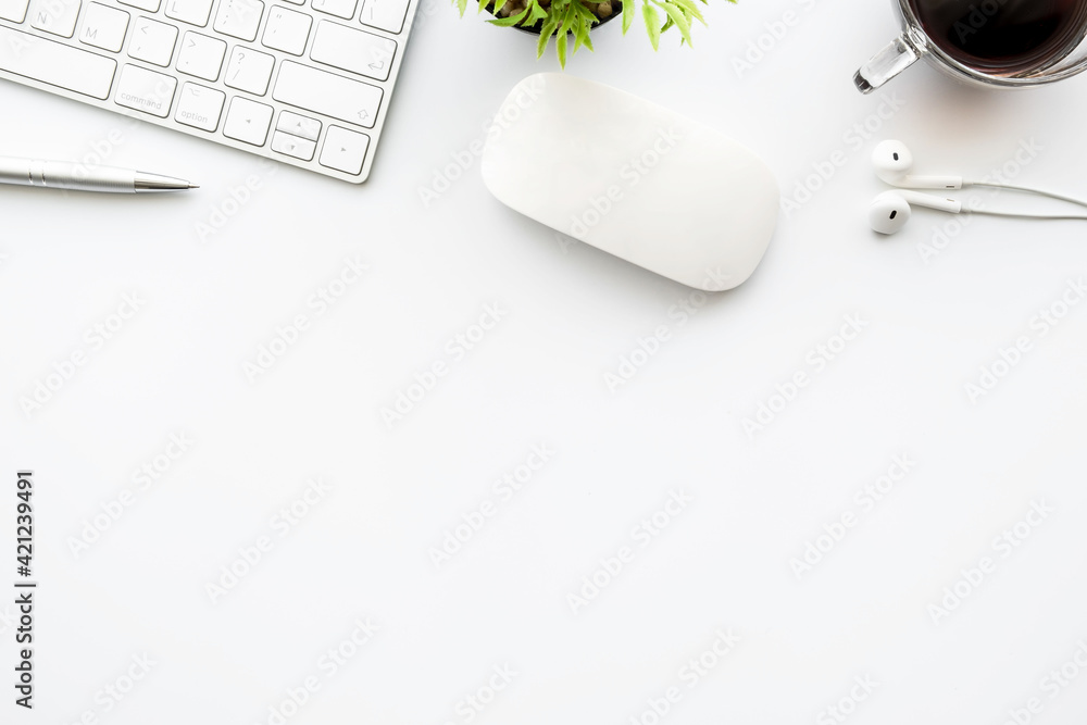 Wall mural minimal white office desk table with computer tools, cup of coffee and office supplies. top view wit