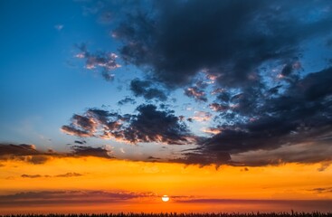 Beautiful heavenly landscape with the sun in the clouds . 