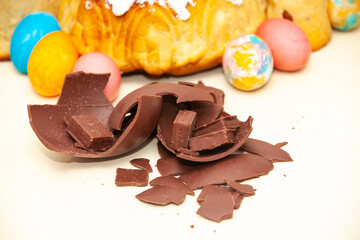 broken chocolate easter egg on white background