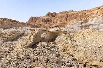 Sandy  mountains in the desert on the shores of the Dead Sea in Israel