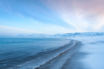Fototapeta premium Scenic seascape of Barents Sea coastline in village Teriberka. Morning arctic winter landscape in Murmansk region of Russia